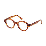 Lunettes de vue rondes ecaillees, de couleur claire, vues de profil