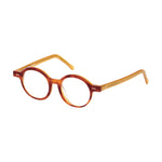 Lunettes de vue rondes ecaillees, de couleur rousse, vues de profil